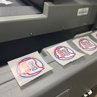 Stickers line a machine in the Montgomery County Board of Elections office. Early, in-person voting ends on Sunday.