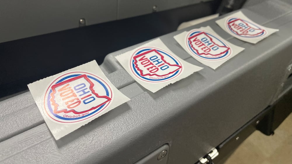 Stickers line a machine in the Montgomery County Board of Elections office. Early, in-person voting ends on Sunday.