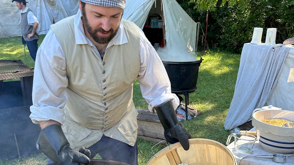 Derick Smith attends to a batch of kettle corn, one of the new foods offered at the 43rd annual Fair at New Boston over Labor Day weekend. CONTRIBUTED