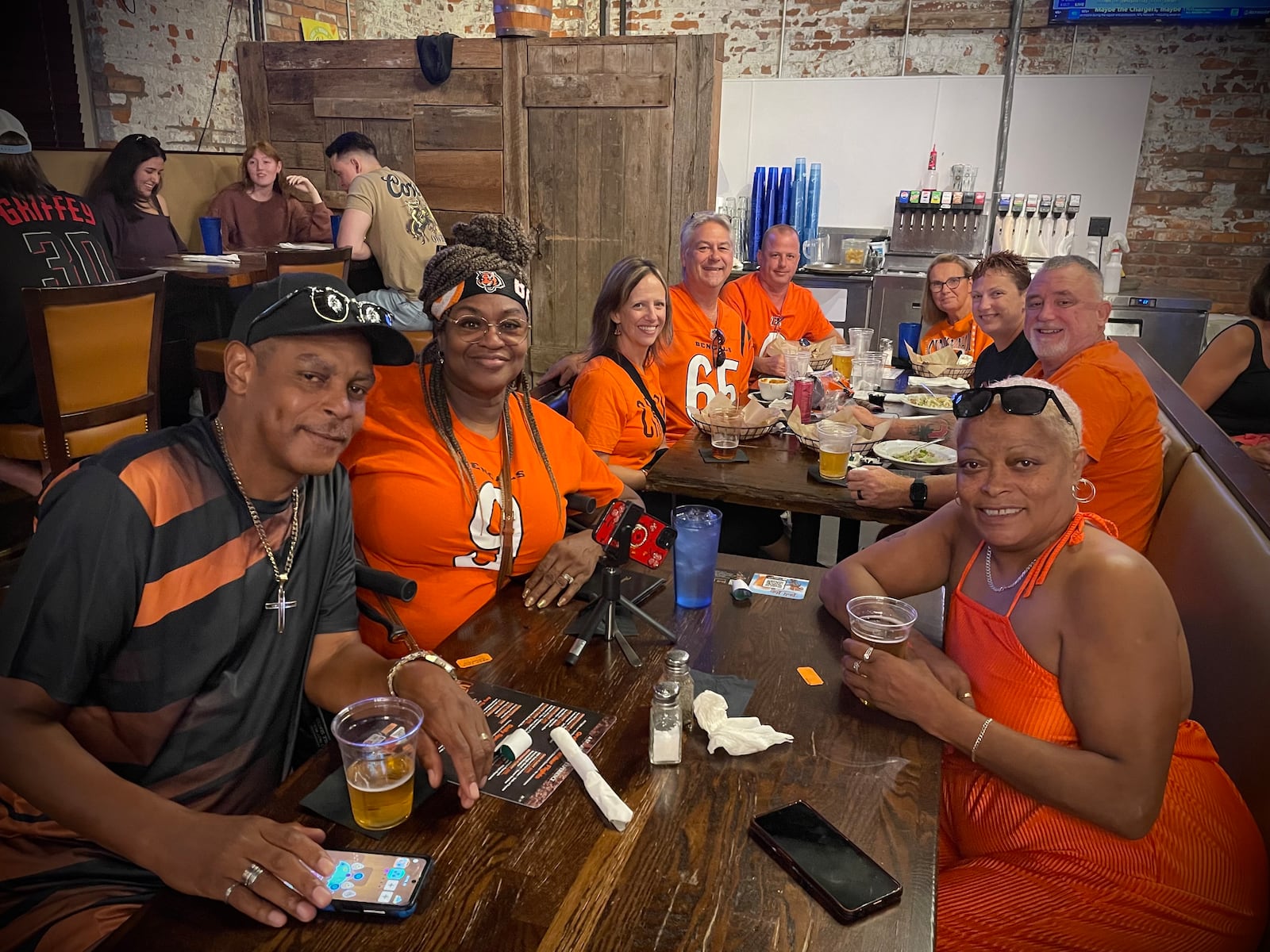 The Cincinnati Bengals hosted an Open in Orange happy hour at the Troll Pub in downtown Dayton on Thursday, Sept. 11. NATALIE JONES/STAFF