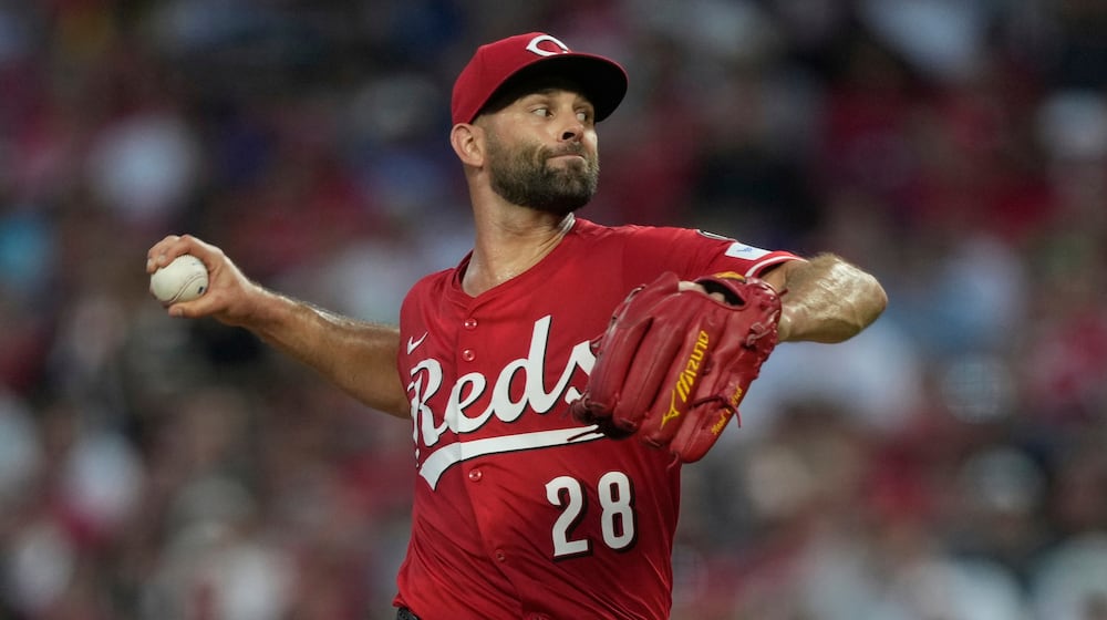 Cincinnati Reds' Nick Martinez throws during the sixth inning of a baseball game against the Los Angeles Dodgers Wednesday, July 30, 2025, in Cincinnati. (AP Photo/Carolyn Kaster)