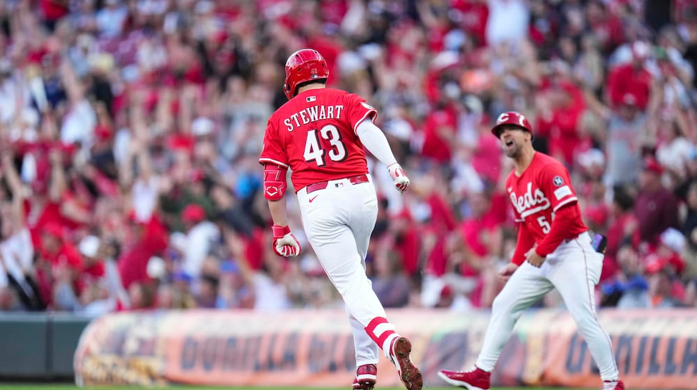 Cincinnati Reds' Sal Stewart (43) rounds the bases after hitting a two-run home run during the second inning of a baseball game against the New York Mets, Saturday, Sept. 6, 2025, in Cincinnati. (AP Photo/Jeff Dean)