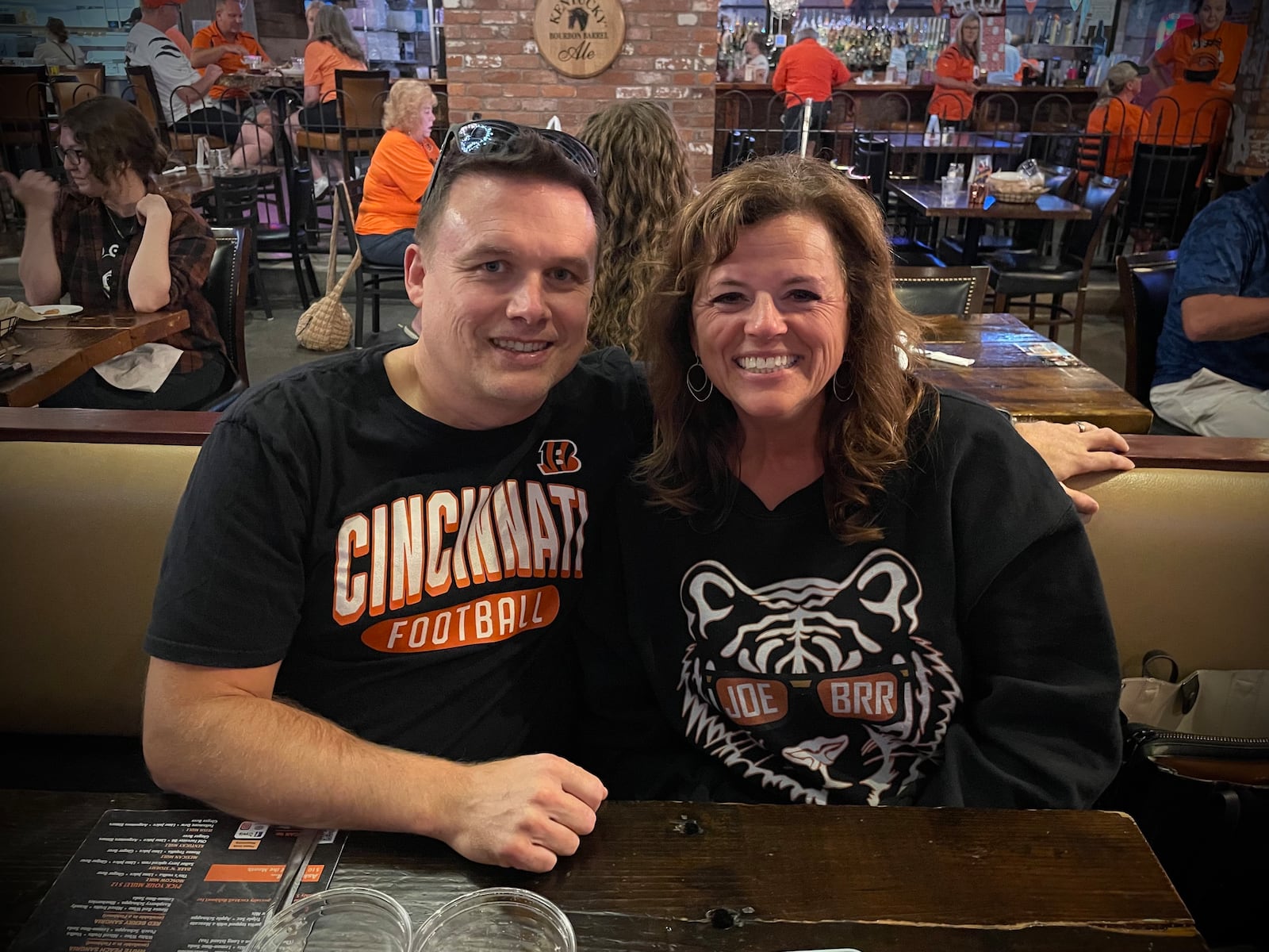 The Cincinnati Bengals hosted an Open in Orange happy hour at the Troll Pub in downtown Dayton on Thursday, Sept. 11. During the event, Amy Hilliard (pictured with her husband) of Centerville won tickets to the home opener. NATALIE JONES/STAFF