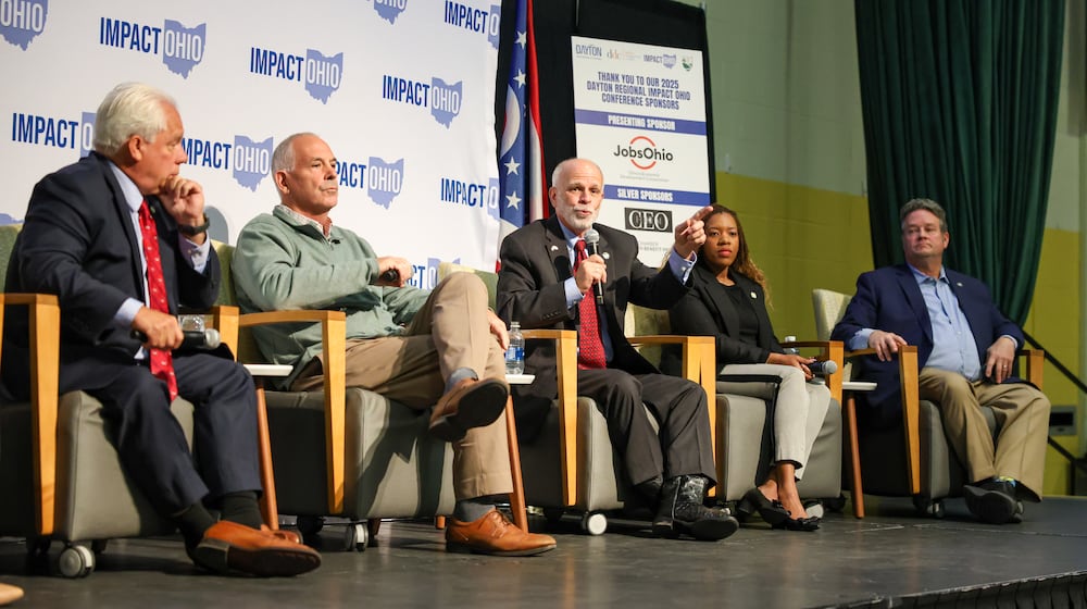 Ohio Sen. Kyle Koehler (R-Springfield) speaks while Rep. Phil Plummer (far left), Sen. Steve Huffman (center left), Rep. Desiree Tims (center right) and Rep. Brian Lampton (far right) during a panel in the Ohio Chamber's 2025 Dayton Regional Impact Ohio Conference on Tuesday, Aug. 26, in the Apollo Room in the Student Union at Wright State University. BRYANT BILLING / STAFF