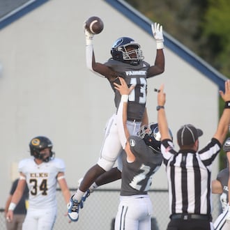 Fairmont celebrates a touchdown by Damien Pattin against Centerville on Friday, Sept. 13, 2024, at Roush Stadium. David Jablonski/Staff
