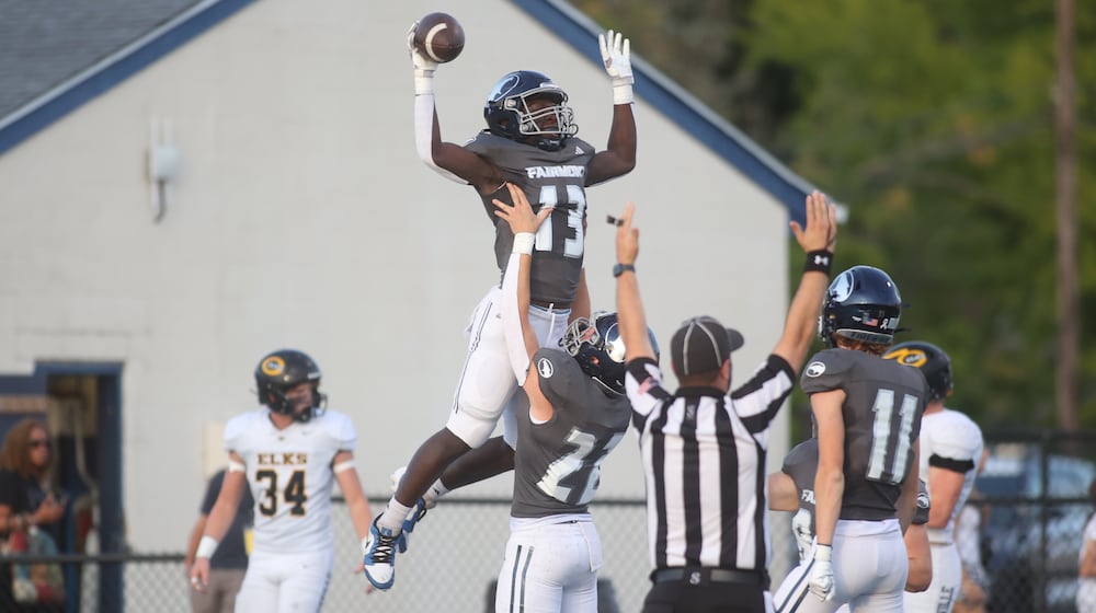 Fairmont celebrates a touchdown by Damien Pattin against Centerville on Friday, Sept. 13, 2024, at Roush Stadium. David Jablonski/Staff