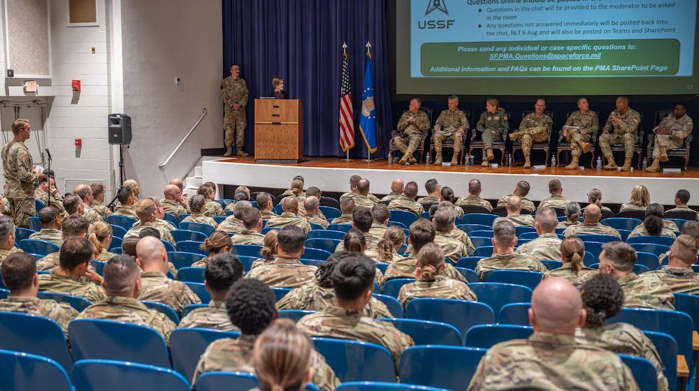 U.S. Space Force and Air Force Reserve senior leaders answer questions during a town hall for members of the 310th Space Wing on the service’s new part-time personnel model at Peterson Space Force Base Event Center, Aug. 2, 2025. (Air Force photo by Tech. Sgt. Frank Casciotta)