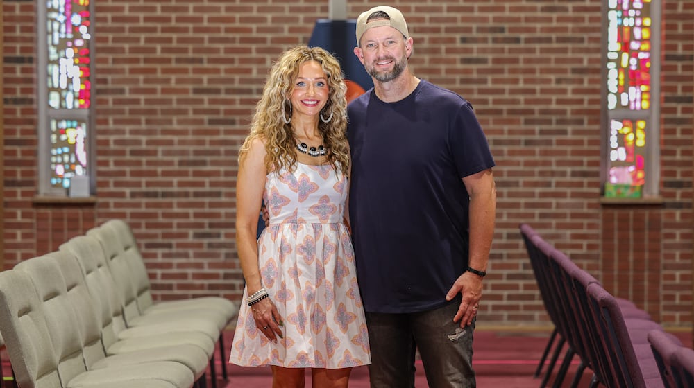 Doug Wampler (right) has been selected as a Dayton Daily News Community Gem. He and his wife, Chrissy, started Engage City Church when they moved to Huber Heights in 2016. BRYANT BILLING / STAFF