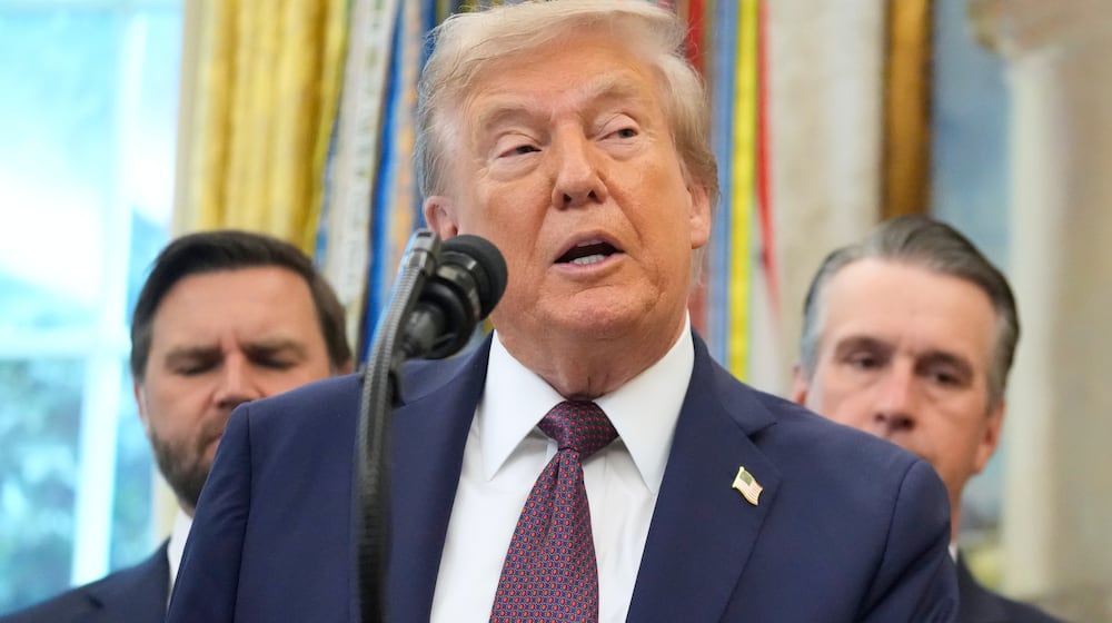 President Donald Trump speaks about the relocation of U.S. Space Command headquarters from Colorado to Alabama in the Oval Office of the White House, Tuesday, Sept. 2, 2025, in Washington. (AP Photo/Mark Schiefelbein)