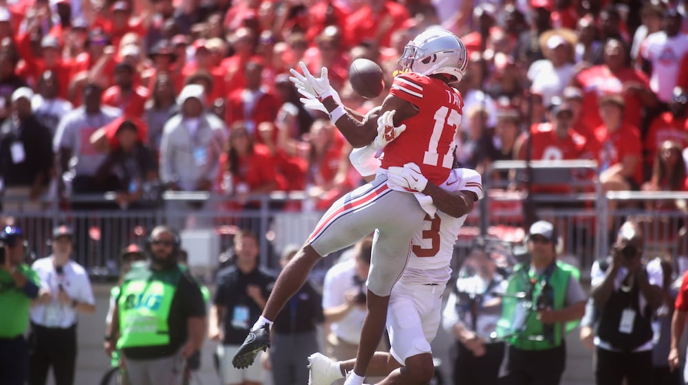 Ohio State's Carnell Tate catches a touchdown in the fourth quarter against Texas on Saturday, Aug. 30, 2025, at Ohio Stadium in Columbus. David Jablonski/Staff