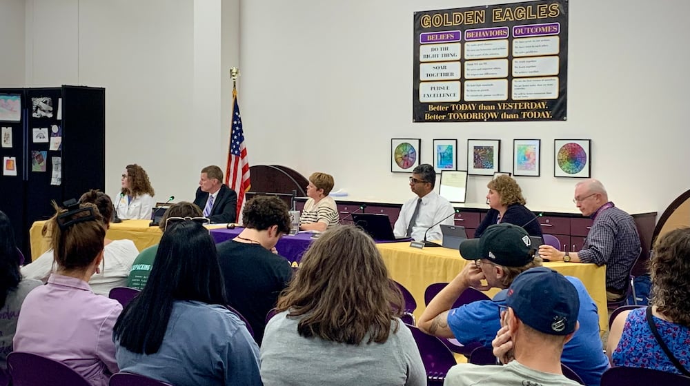 A large number of people attended the Bellbrook School Board meeting Thursday, August 14, 2025 to discuss the impacts of closing the high school library for a review of “sexuality and gender content.” LONDON BISHOP/STAFF