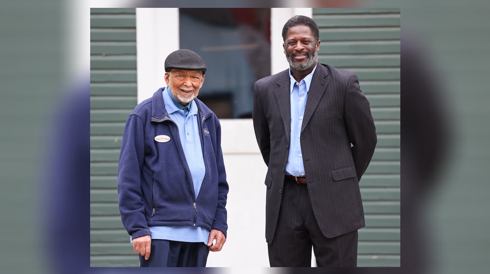 Cedric D. Howard (right) has been named a Dayton Daily News Community Gem for his work raising money as an Alzheimer's advocate. He was nominated by Chuck Johnson (left), who serves with him on the preservation Dayton board. BRYANT BILLING / STAFF