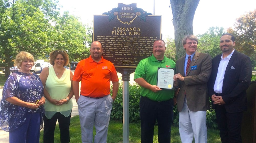 Sharon Cassano, Lora Hammons Cassano, Chip and Chris Cassano, Andy Verhoff and Ron Campbell. Cassano’s Pizza King was honored with a historical marker outside their headquarters in Kettering by the Ohio History Connection in 2016.