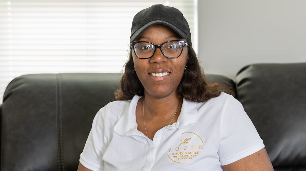 Courtney Brandon has been named a Dayton Daily News Community Gem for her work founding The Youth Luxury Shuttle, which transports kids to and from school. BRYANT BILLING / STAFF