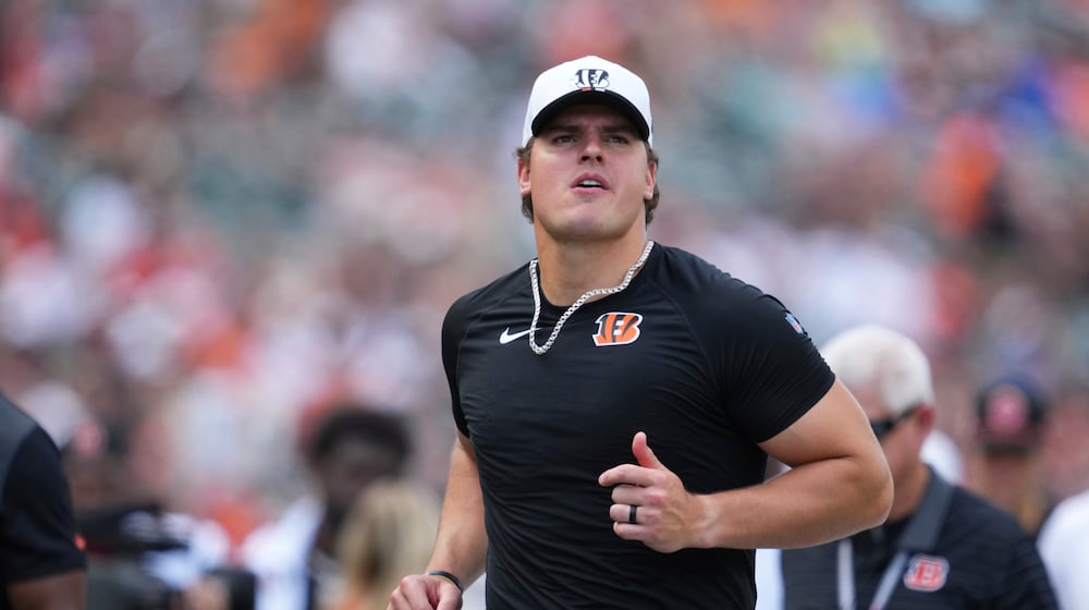 Cincinnati Bengals defensive end Trey Hendrickson runs off the field during a preseason NFL football game against the Indianapolis Colts, Saturday, Aug. 23, 2025, in Cincinnati. (AP Photo/Jeff Dean)