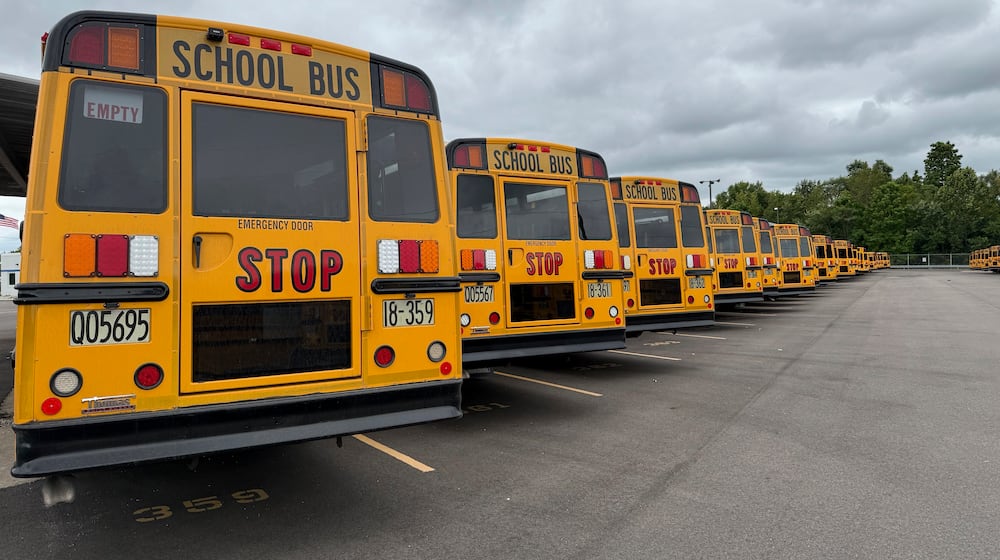FILE PHOTO: School buses are parked inside the Dayton Public Transportation center on Thursday, August 21, 2025 in Dayton, Ohio. (AP Photo/Patrick Aftoora-Orsagos)