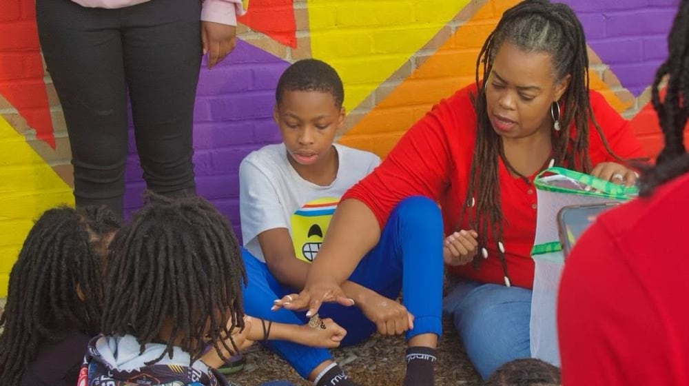 The Boys and Girls Club learns about butterflies. CONTRIBUTED