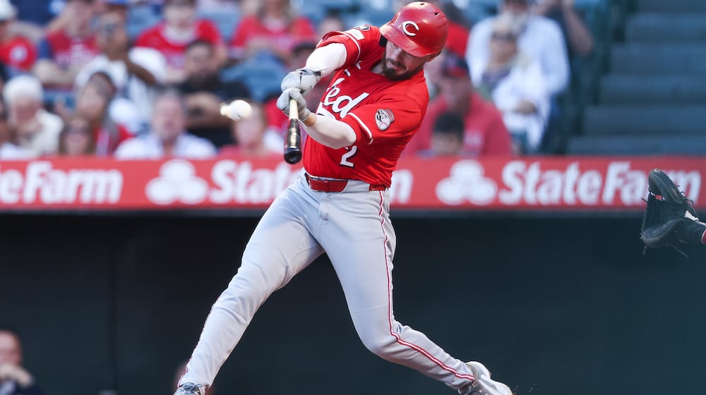 Cincinnati Reds designated hitter Gavin Lux hits a home run during the first inning of a baseball game against the Los Angeles Angels, Monday, Aug. 18, 2025, in Anaheim, Calif. (AP Photo/Jessie Alcheh)