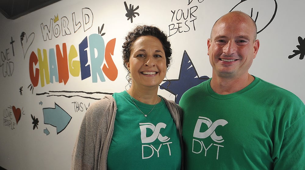 Community Gems, Paul and Dana Groves are volunteers at the Dayton Dream Center. MARSHALL GORBY\STAFF