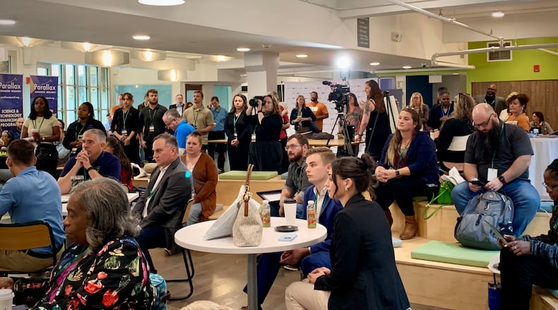 Entrepreneurs gather for opening remarks during the first day of Launch Dayton Startup Week. LONDON BISHOP/STAFF