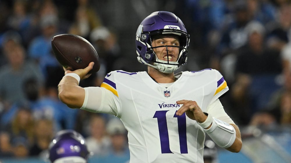 Minnesota Vikings quarterback Brett Rypien (11) throws against the Tennessee Titans during the first half of a preseason NFL football game, Friday, Aug. 22, 2025, in Nashville, Tenn. (AP Photo/John Amis)