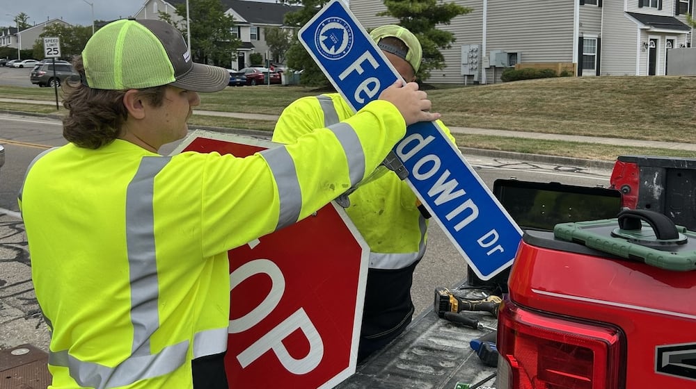 Miami Twp. Public Works employees install new, more visible street signs Thursday, Aug 21, 2025. Nearly 1,000 signs are being replaced on township-maintained streets, but not Ohio Department of Transportation or Montgomery County signs. CONTRIBUTED