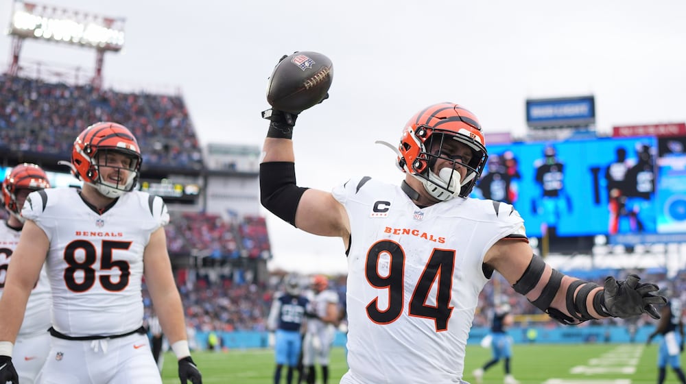 Cincinnati Bengals defensive end Sam Hubbard (94) celebrates a touchdown during the first half of an NFL football game against the Tennessee Titans, Sunday, Dec. 15, 2024, in Nashville, Tenn. (AP Photo/George Walker IV)