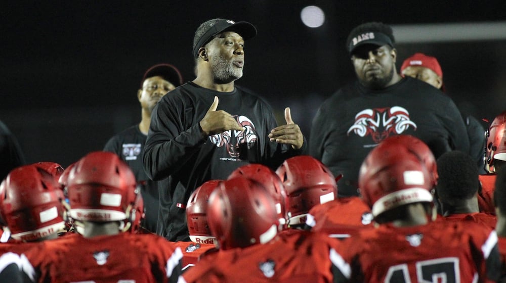 Trotwood-Madison’s Jeff Graham talks to the team after a loss to Pickerington Central in September 2018 in Trotwood. David Jablonski/Staff
