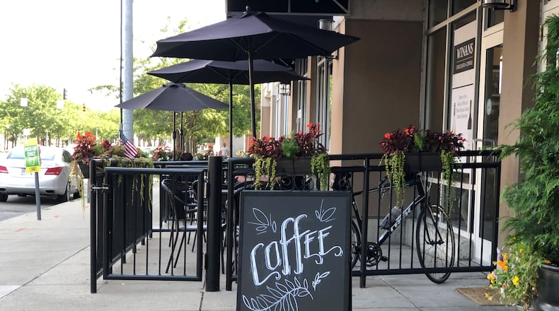 The patio of Winans Chocolates + Coffees in downtown Dayton. CORNELIUS FROLIK / STAFF