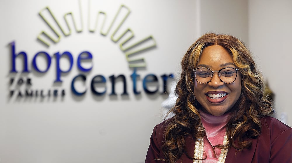 Malloree Ellis was named a Dayton Daily News Community Gem for her work at the Omerga CDC where she is the manager of family services. MARSHALL GORBY\STAFF