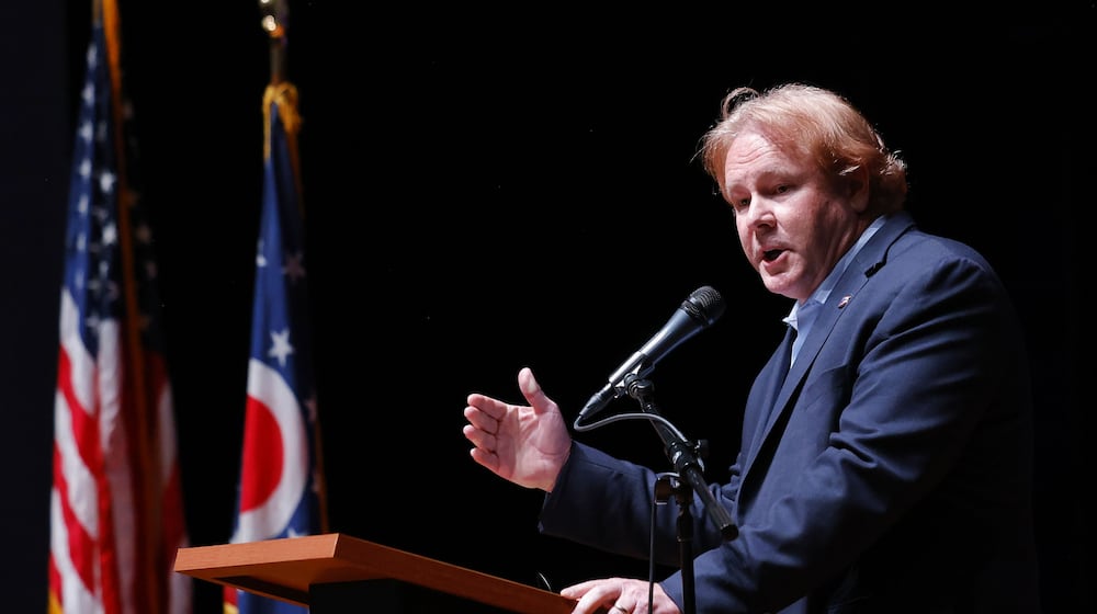 Congressman Warren Davidson spoke and answered questions during a congressional town hall event at a packed auditorium at Edgewood Middle School Wednesday, Aug. 27, 2025. NICK GRAHAM/STAFF