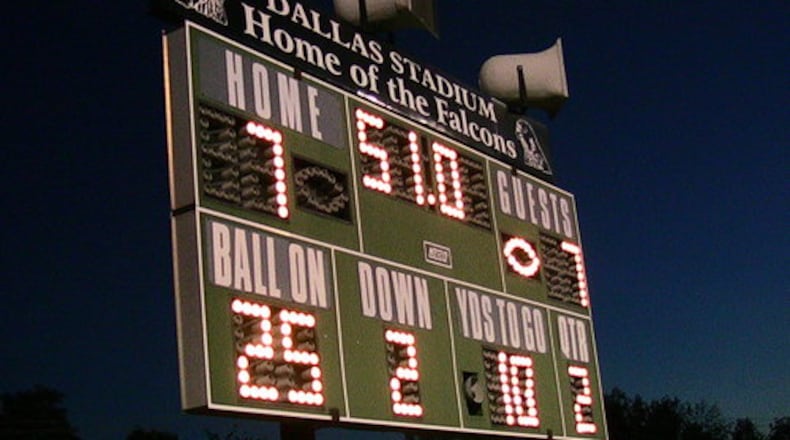 The scoreboard at Dallas Stadium in St. Paris. DAVID JABLONSKI/STAFF PHOTO