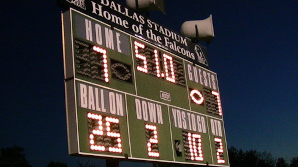 The scoreboard at Dallas Stadium in St. Paris. DAVID JABLONSKI/STAFF PHOTO