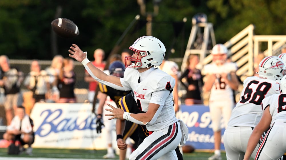 Tippecanoe High School junior quarterback Larkin Thomas throws a pass during their game against  Bellbrook on Friday, Aug. 22 at Miami Valley South Stadium. The Red Devils on 21-0. NICK FALZERANO / CONTRIBUTED PHOTO