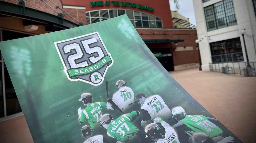 To celebrate the Dayton Dragons' 25th season, the organization is giving fans free collectable posters. NATALIE JONES/STAFF