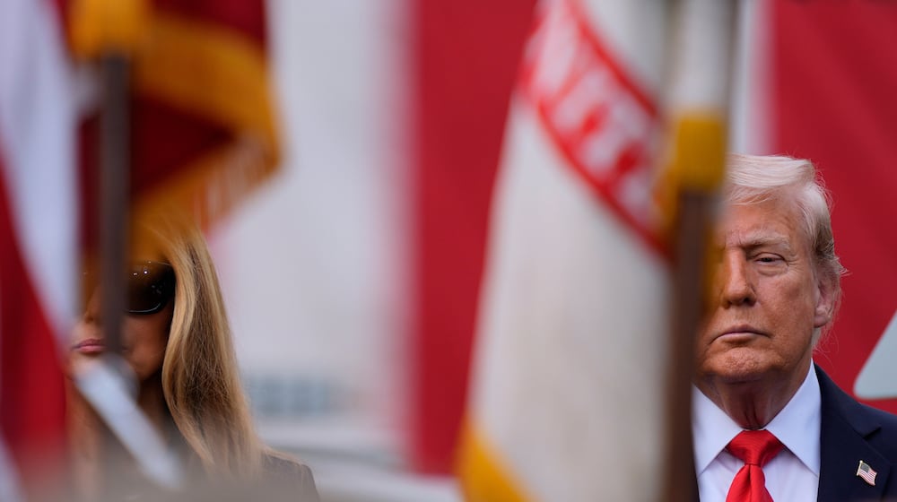 President Donald Trump and first lady Melania Trump attend a ceremony at the Pentagon to commemorate the 24th anniversary of the 9/11 attacks, Thursday, Sept. 11, 2025, in Washington. (AP Photo/Julia Demaree Nikhinson)