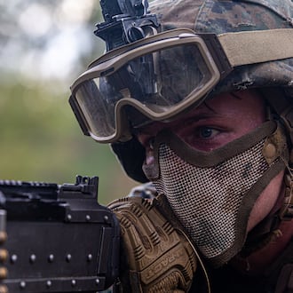 U.S. Marine Corps Lance Cpl. Levi Moell, a machine gunner with Bravo Company, 1st Battalion, 6th Marine Regiment, 2nd Marine Division, provides security on Nov. 11, 2020 at De Soto National Forest in Mississippi. JACQUELINE PARSONS/U.S. MARINE CORPS