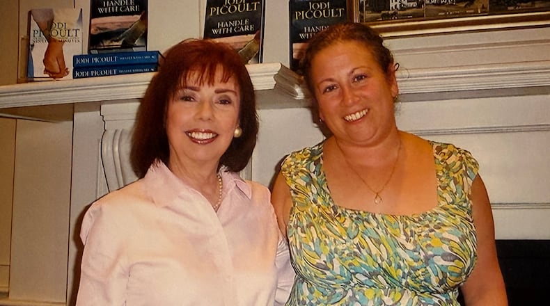 For 35 years Sharon Kelly Roth, left, was director of public relations for Books&Co. Here she is pictured with Jodi Picoult who, says Roth, writes "contemporary, engaging stories that are popular with book clubs. 
CONTRIBUTED