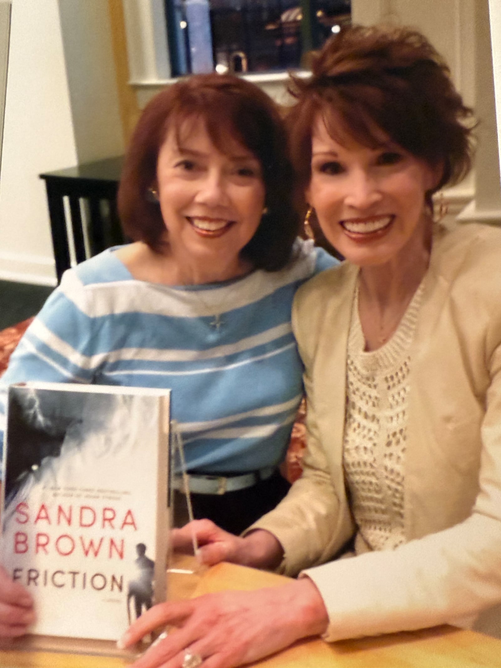 Popular romance author Sandra Brown, right, visited  Books&Co in 2015 with her book, "Friction." She is seen here with then-PR director for Books&Co Sharon Kelly Roth. CONTRIBUTED