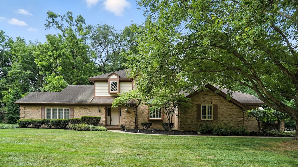 This brick two story features four bedrooms, with one on the first floor, and oversized living and family rooms. CONTRIBUTED