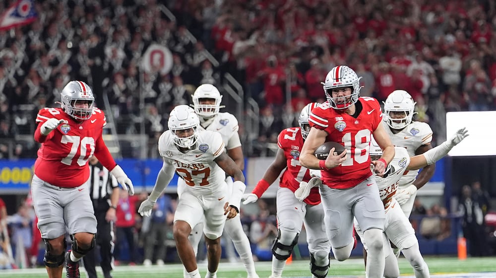 FILE - Ohio State quarterback Will Howard (18) runs against Texas during the second half of the Cotton Bowl College Football Playoff semifinal game, Jan. 10, 2025, in Arlington, Texas. (AP Photo/Julio Cortez, File)