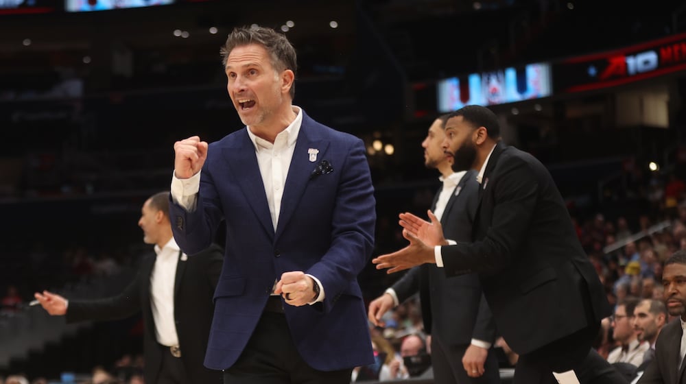 Billy Lange, of Saint Joseph’s, coaches during a game against Dayton on Friday, March 14, 2025, in the quarterfinals of the Atlantic 10 Conference tournament at Capital One Arena in Washington, D.C. David Jablonski/Staff