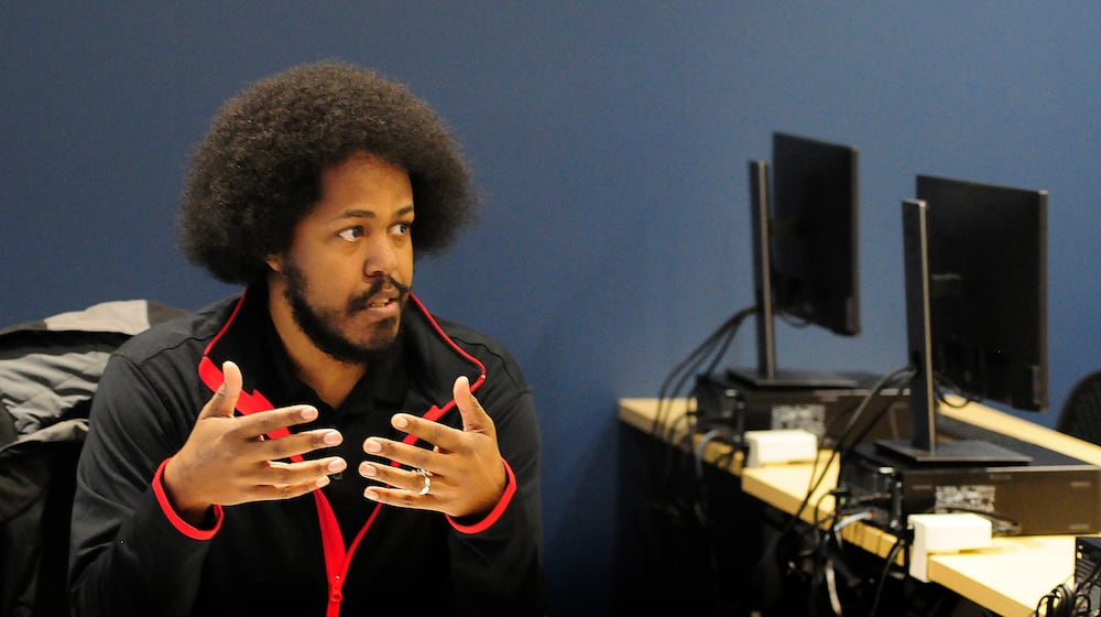 Sinclair Community College instructor Liban Knight teaches an Information Technology class Wednesday, Jan. 24, 2024. MARSHALL GORBY\STAFF