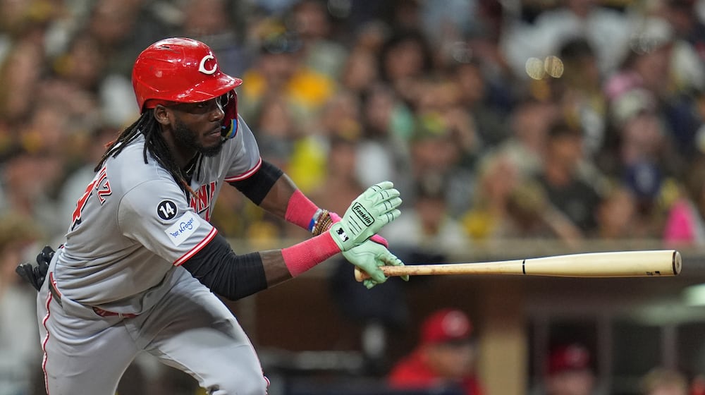 Cincinnati Reds' Elly De La Cruz watches his RBI single during the eighth inning of a baseball game against the San Diego Padres Wednesday, Sept. 10, 2025, in San Diego. (AP Photo/Gregory Bull)