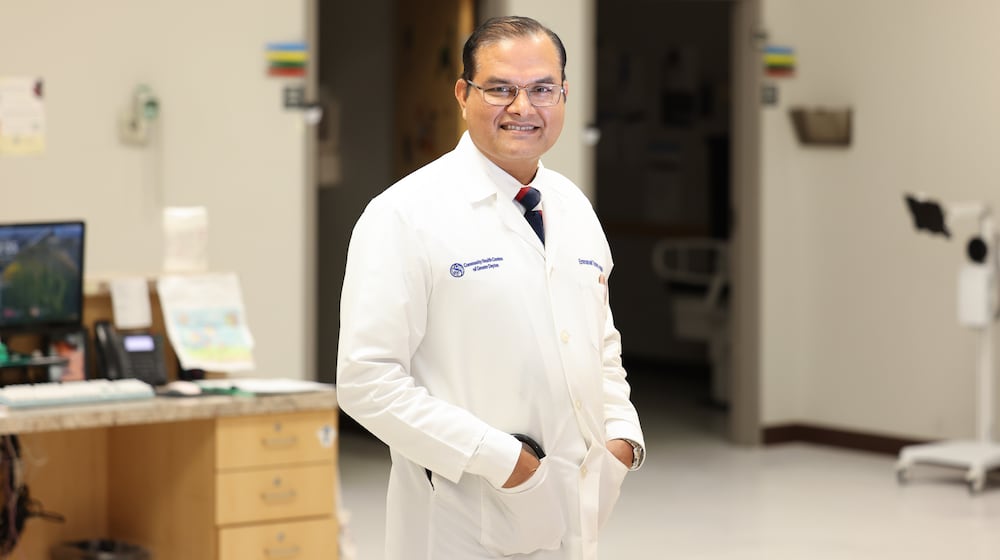 Emmanuel Dsouza has been named a Dayton Daily News Community Gem for his work at Community Health Centers of Greater Dayton, where he is nurse practitioner. BRYANT BILLING / STAFF