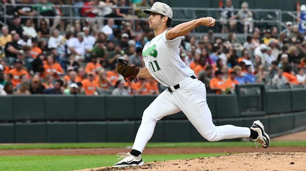 Dayton's Nick Sando delivers a pitch to the plate during their game against Lansing on Saturday, Aug. 23 at Day Air Ballpark. JEFF GILBERT/CONTRIBUTED
