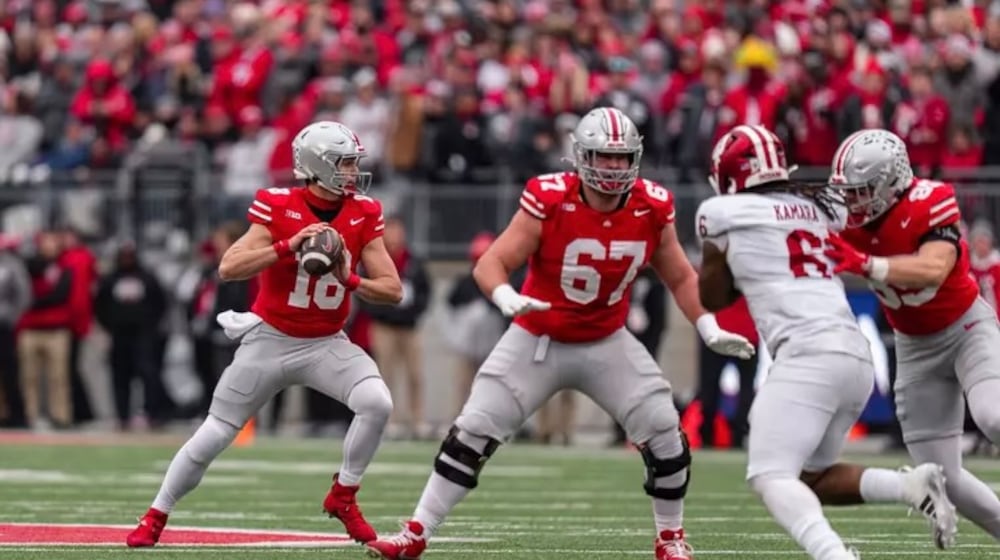 Ohio State's Austin Siereveld (67) protects quarterback Will Howard during a game this season vs. Indiana. Siereveld is a 2023 Lakota East graduate who has started seven games this season at right guard. OHIO STATE ATHLETICS / CONTRIBUTED PHOTO