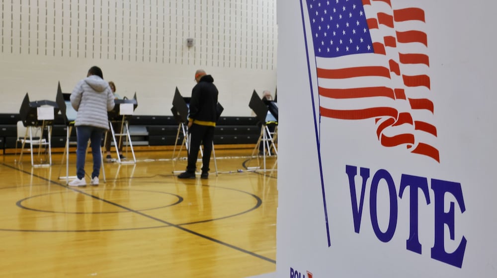 Tax levy language on voter ballots must be more clear, Hamilton County Commissioner Denise Driehaus told a group debating how to handle property tax reform in the state of Ohio. In this photo, voters are seen at Rosa Parks Elementary in Middletown. FILE