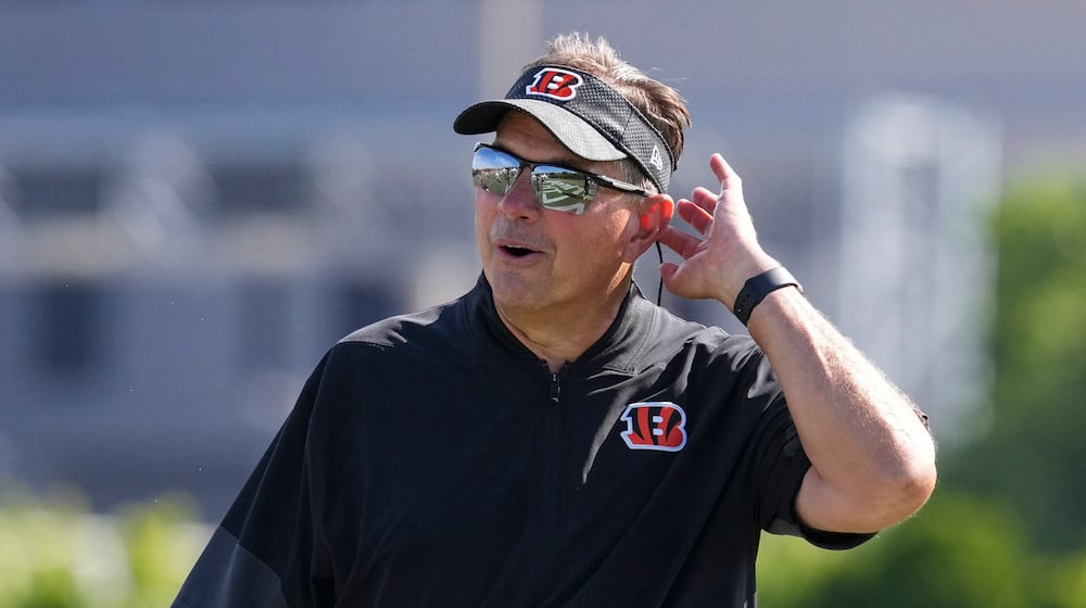 Cincinnati Bengals defensive coordinator Al Golden looks on during practice at the team's NFL football training camp, July 27, 2025, in Cincinnati. (AP Photo/Jeff Dean, File)