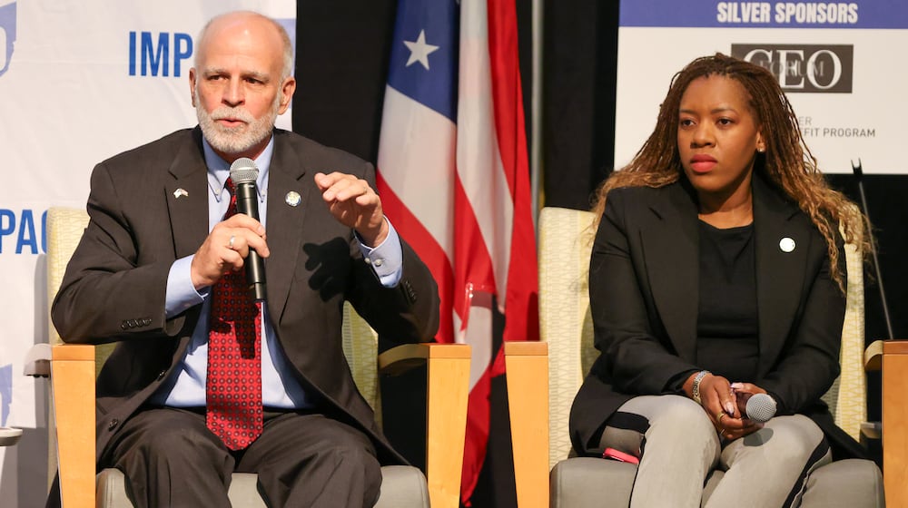 Ohio Sen. Kyle Koehler (R-Springfield) speaks while Rep. Desiree Tims (D-Dayton) listens during a panel in the Ohio Chamber's 2025 Dayton Regional Impact Ohio Conference on Tuesday, Aug. 26, in the Apollo Room in the Student Union at Wright State University. BRYANT BILLING / STAFF